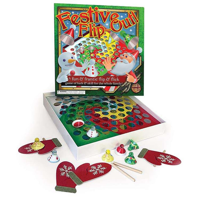 Festive Flip Out Christmas game with board, cards, and festive-themed accessories.