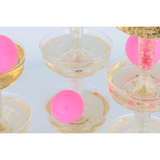 HENBRANDT Single Prosecco Pong Game Set with pink pong balls in plastic coupe glasses.