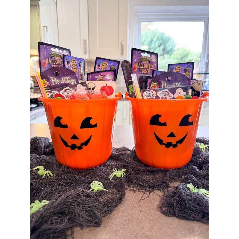 Halloween-themed boo basket with pumpkin design and spooky goodies.