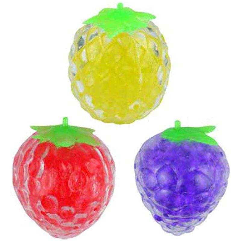 Squeeze fruit sensory toy set with three assorted fruit shapes.